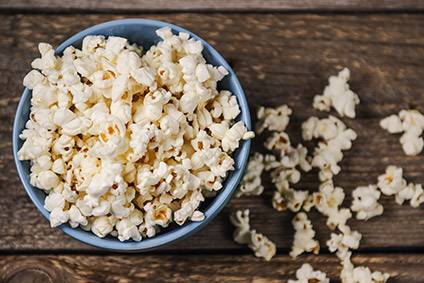 Intersnack buys stake in popcorn firm Natais' parent