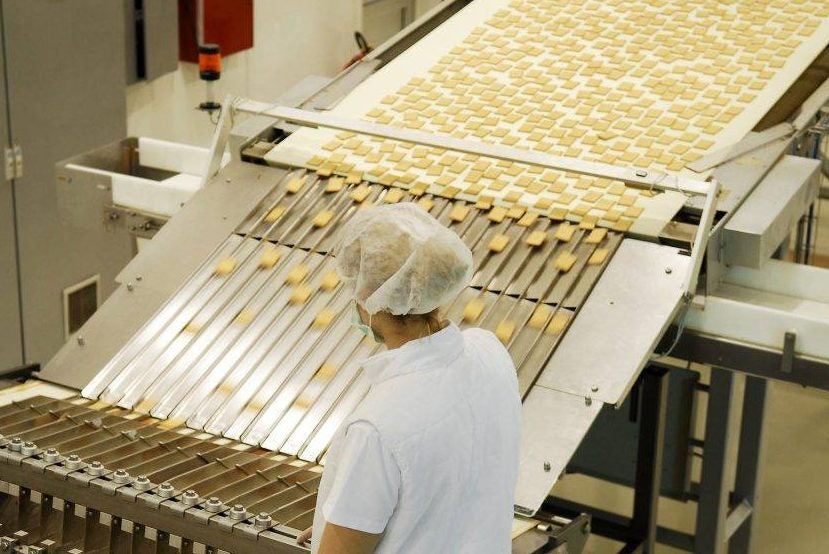 Conveyor belt in snacks manufacturing plant