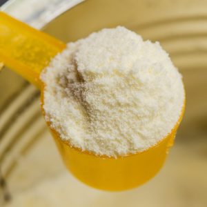 Infant formula scooped from a tin