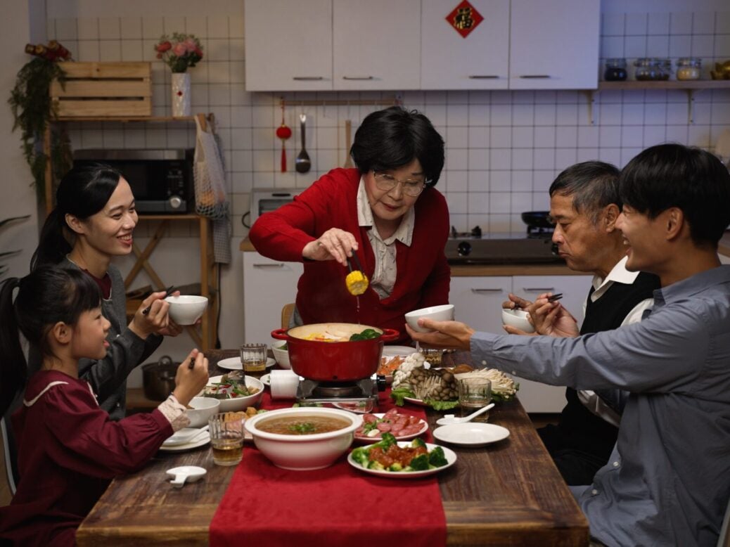 Family eating Lunar New Year's eve meal