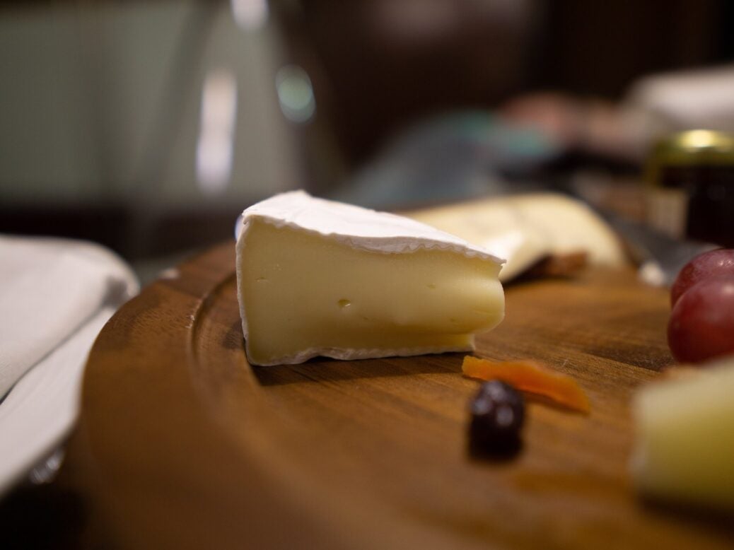 Brie on wooden board
