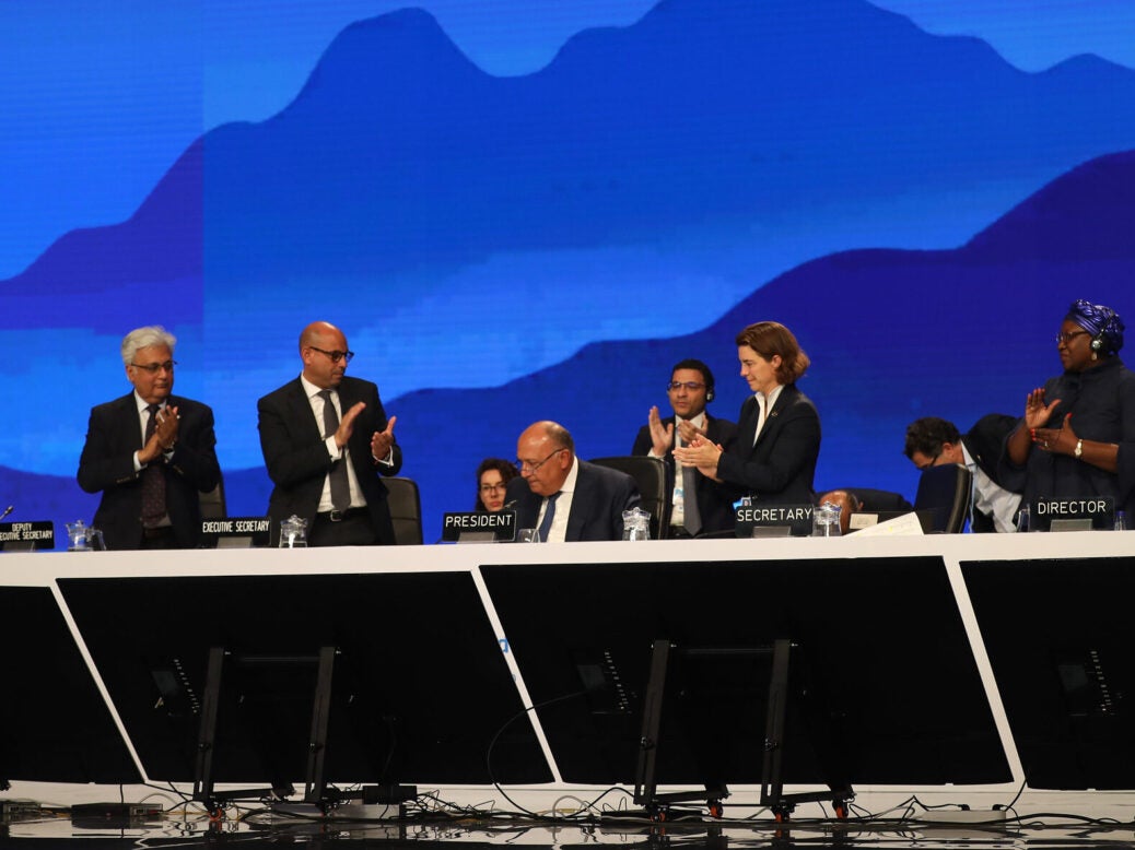 COP27 president and Egyptian Foreign Minister Sameh Shoukry (centre) speaks at the closing plenary session, 19 November 2022