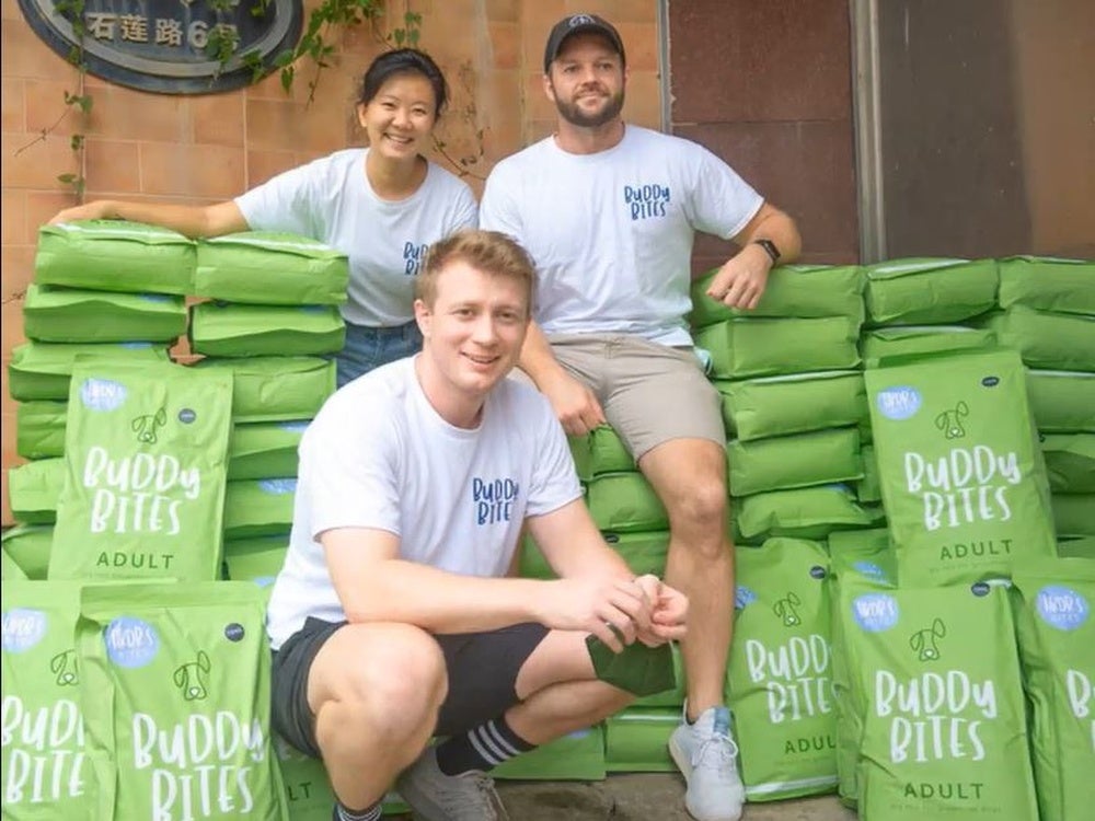 Buddy Bites pet food bags stacked up in a dog shelter in Hong Kong