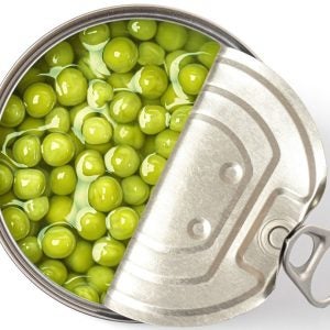 Green peas canned isolated on white background., Green peas in a can top view..With clipping path